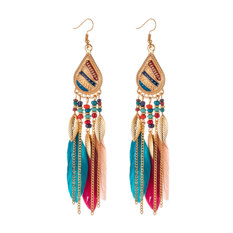 Feather earrings and pearl earrings - SELFTRITSS